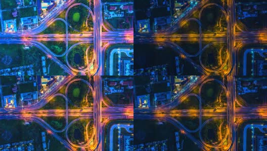 鸟瞰图高速公路的时间流逝，高速公路和高速公路在交叉口的细节在晚上高清在线视频素材下载