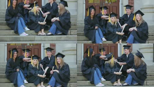 一群毕业生坐在学校台阶上高清在线视频素材下载