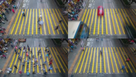 慢镜头:行人穿过香港九龙弥敦道旺角花园街市的人行横道高清在线视频素材下载