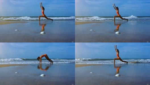 女人让瑜伽勇士在泡沫波附近的海滩上摆姿势高清在线视频素材下载