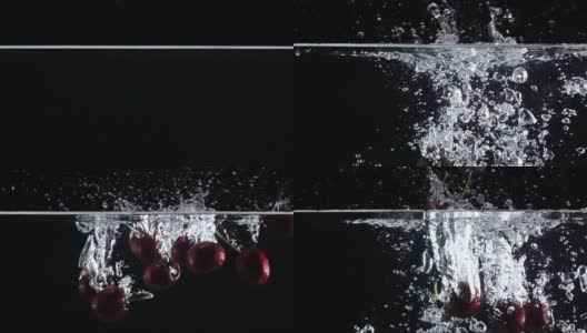 超级慢动作:樱桃滴入淡水在黑色背景高清在线视频素材下载
