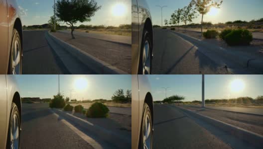 车辆轮胎朝着日落方向行驶高清在线视频素材下载
