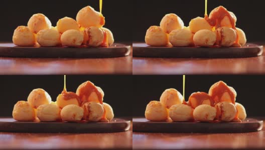 美味酥脆的奶酪面包配帕尔马干酪雨，这是巴西米纳斯吉拉斯州的传统高清在线视频素材下载