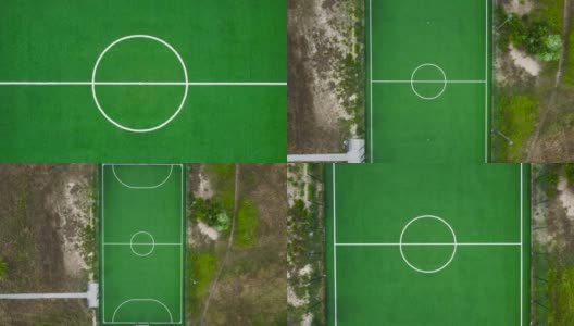 室外迷你足球场位于草地之间，垂直鸟瞰高清在线视频素材下载