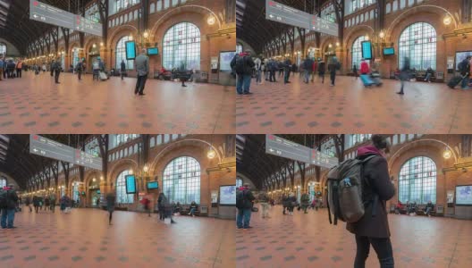 行人特拉伯勒在哥本哈根火车站终点站拥挤的时光流逝高清在线视频素材下载