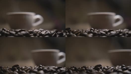 热咖啡杯放在咖啡豆上高清在线视频素材下载