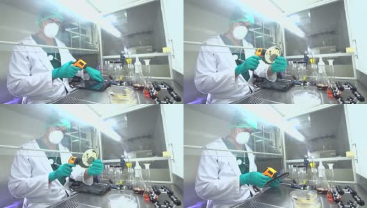 研究人员在实验室使用显微镜高清在线视频素材下载