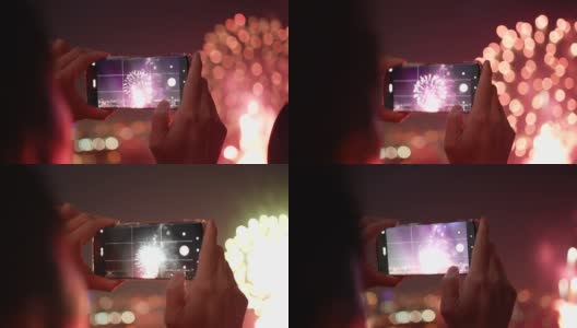 用智能手机在庆典烟花现场拍照高清在线视频素材下载