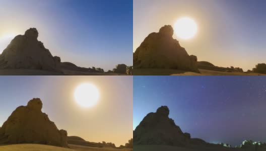 月亮从沙漠中的巨石中升起高清在线视频素材下载