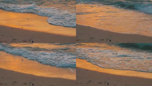 非常美丽的日落在海边。沙滩和海浪拍打着沙滩高清在线视频素材下载