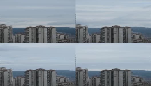 拍摄于多云天气的成都，垂直屏幕城市高楼大厦高清在线视频素材下载