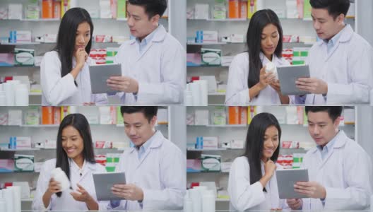 图为在医院药房检查药品的男女药剂师的照片。亚洲医生正在检查药片上的药物数据，穿着医疗外套。有药店药学背景的货架。高清在线视频素材下载
