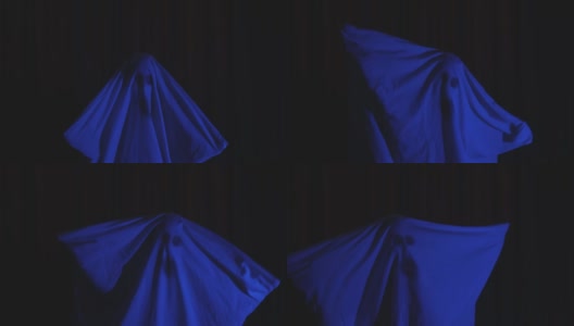 万圣节派对服装鬼床单幽灵脸，恐怖概念暗蓝色灯高清在线视频素材下载