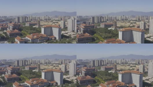 航拍现代城市中具有中国特色的古塔高清在线视频素材下载