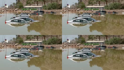 沙漠停车路上被淹的汽车。深水。洪水自然。高清在线视频素材下载