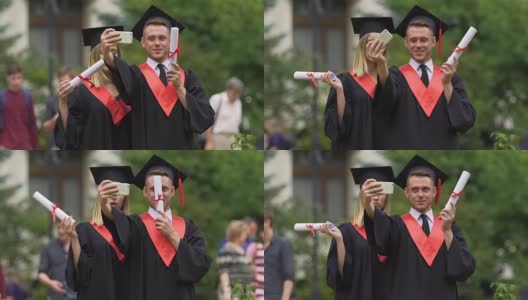 男男女女在毕业典礼后穿着学院装自拍高清在线视频素材下载