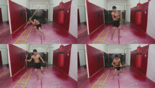 亚洲人在健身房训练跆拳道，拳击手，武术，运动高清在线视频素材下载