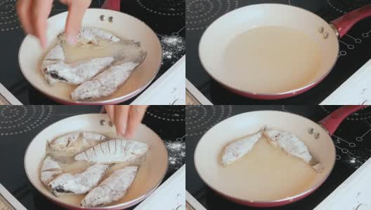 在油煎锅上煎鲤鱼的人。特写男子的手把鱼放在煎锅上。高清在线视频素材下载