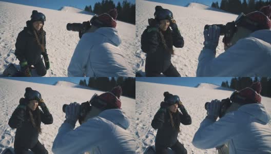 滑雪板或滑雪者和摄影师使照片会议在滑雪胜地中景高清在线视频素材下载