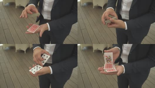 魔术师用扑克牌展示焦点高清在线视频素材下载