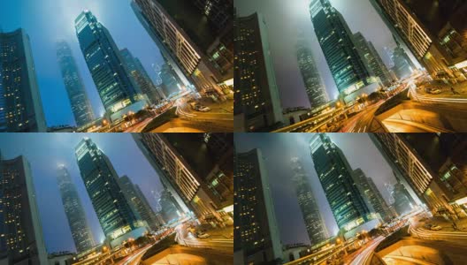 TL D2N TD夜晚的香港城市景观，中区快速的交通和摩天大楼高清在线视频素材下载