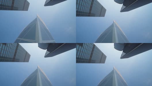 现代化的摩天大楼映衬着蓝天。未来主义的现代建筑。高清在线视频素材下载