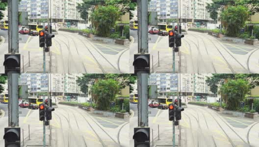交通灯由绿色变为闪烁，变为红色港岛电车高清在线视频素材下载