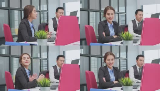 亚洲年轻的商业人士在办公室开会讨论。男人和女人有交流头脑风暴和共同工作的项目作为团队。现代同事的企业高清在线视频素材下载