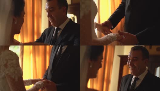 新娘和她的父亲在婚礼前的亲密时刻高清在线视频素材下载