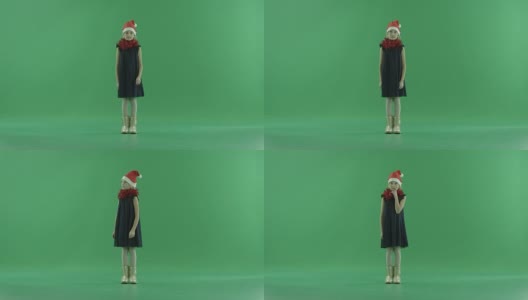 戴着圣诞帽沉思的小女孩，背景是色度键高清在线视频素材下载