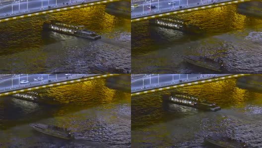 布达佩斯，多瑙河上的游船在斯切尼链桥下航行高清在线视频素材下载