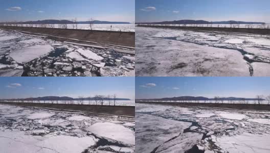 伏尔加河部分结冰，大块的冰形成了蓝白相间的图案。高清在线视频素材下载