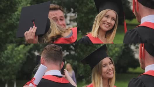 快乐的一对同学拥抱转身，毕业典礼高清在线视频素材下载