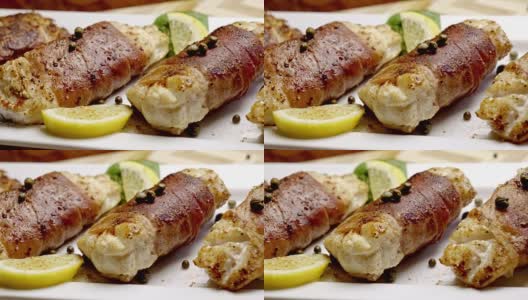 帕尔玛火腿用羊角面包包裹着鳕鱼高清在线视频素材下载