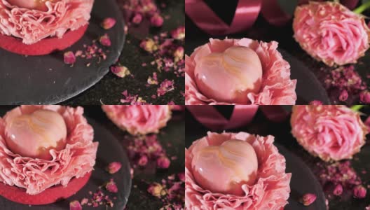 彩色的心形甜点在桌子上与花，特写高清在线视频素材下载