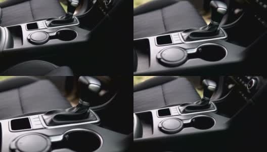 豪华汽车内饰-驾驶员座椅，方向盘，变速杆，仪表盘和电脑。高清在线视频素材下载