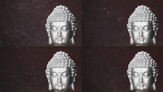 画面中佛陀的粉尘呈黑色背景高清在线视频素材下载