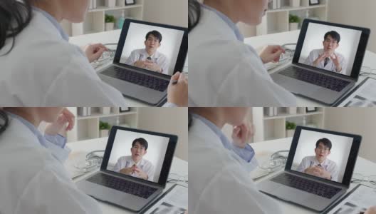 亚洲医生会议在办公室电脑上进行视频电话会议。高清在线视频素材下载