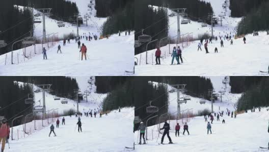 在班斯科世界杯滑雪中心度假胜地的冬季滑雪人群高清在线视频素材下载