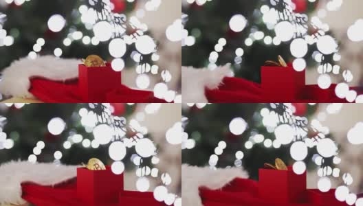 圣诞加密货币，在礼品盒上的一棵圣诞树和彩灯高清在线视频素材下载
