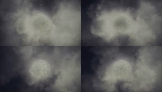 巨大的满月在云后流逝。高清在线视频素材下载