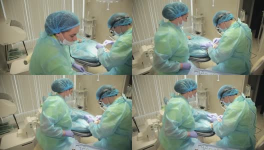 外科医生团队在手术室里一起工作高清在线视频素材下载