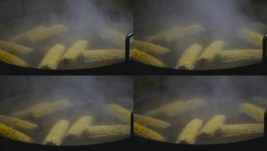 玉米。用平底锅煮的玉米头高清在线视频素材下载
