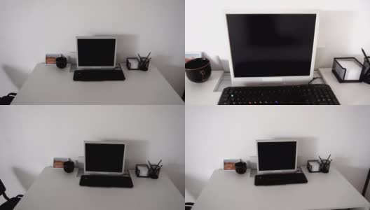 工作地点在一个白色洁净的房间里，桌上有一台电脑。高清在线视频素材下载