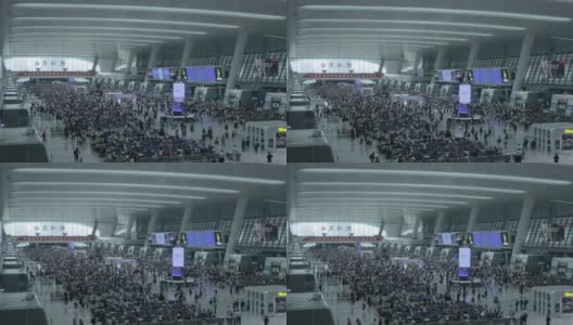 一个中国火车站未来主义的主要出发大厅里的人们高清在线视频素材下载