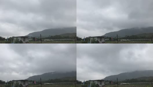 时间推移-雨农舍湿气云移过山高清在线视频素材下载