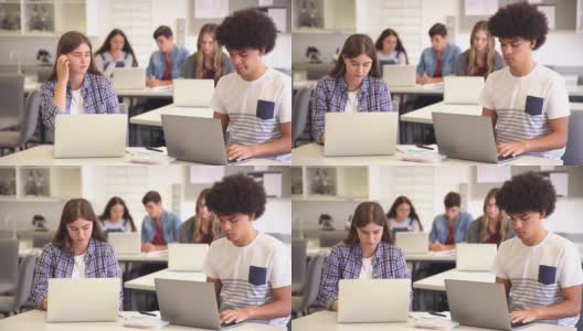 学生在大学上电脑课时使用笔记本电脑高清在线视频素材下载