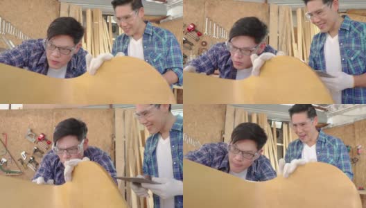 聚精会神的人切割木板。一位工匠正在制作展示盒和椅子。高清在线视频素材下载