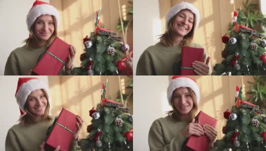 那位年轻女子收到圣诞礼物非常高兴高清在线视频素材下载