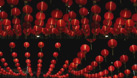 中国灯笼在夜里随风舞动。高清在线视频素材下载